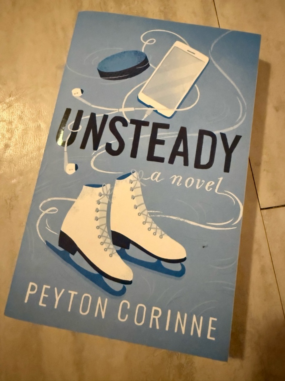 Unsteady by Peyton Corinne - Light Blue Cover with White Ice Skates